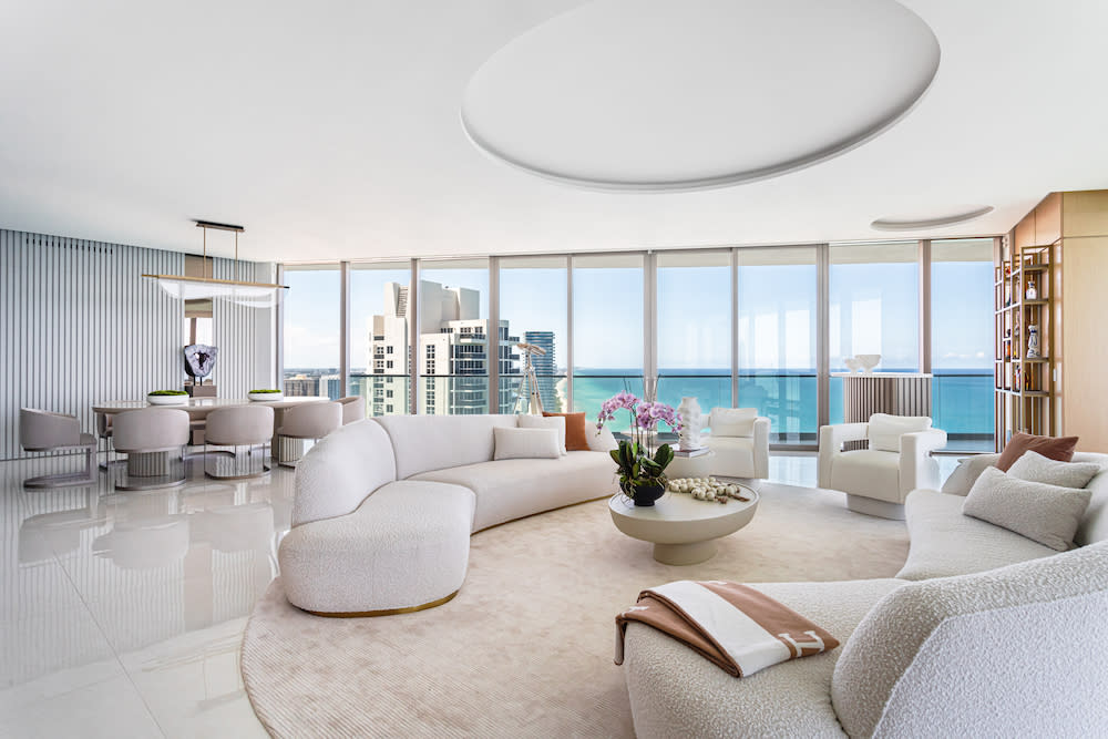 Stylish living room with panoramic ocean views, blending comfort and beauty for a perfect seaside retreat.