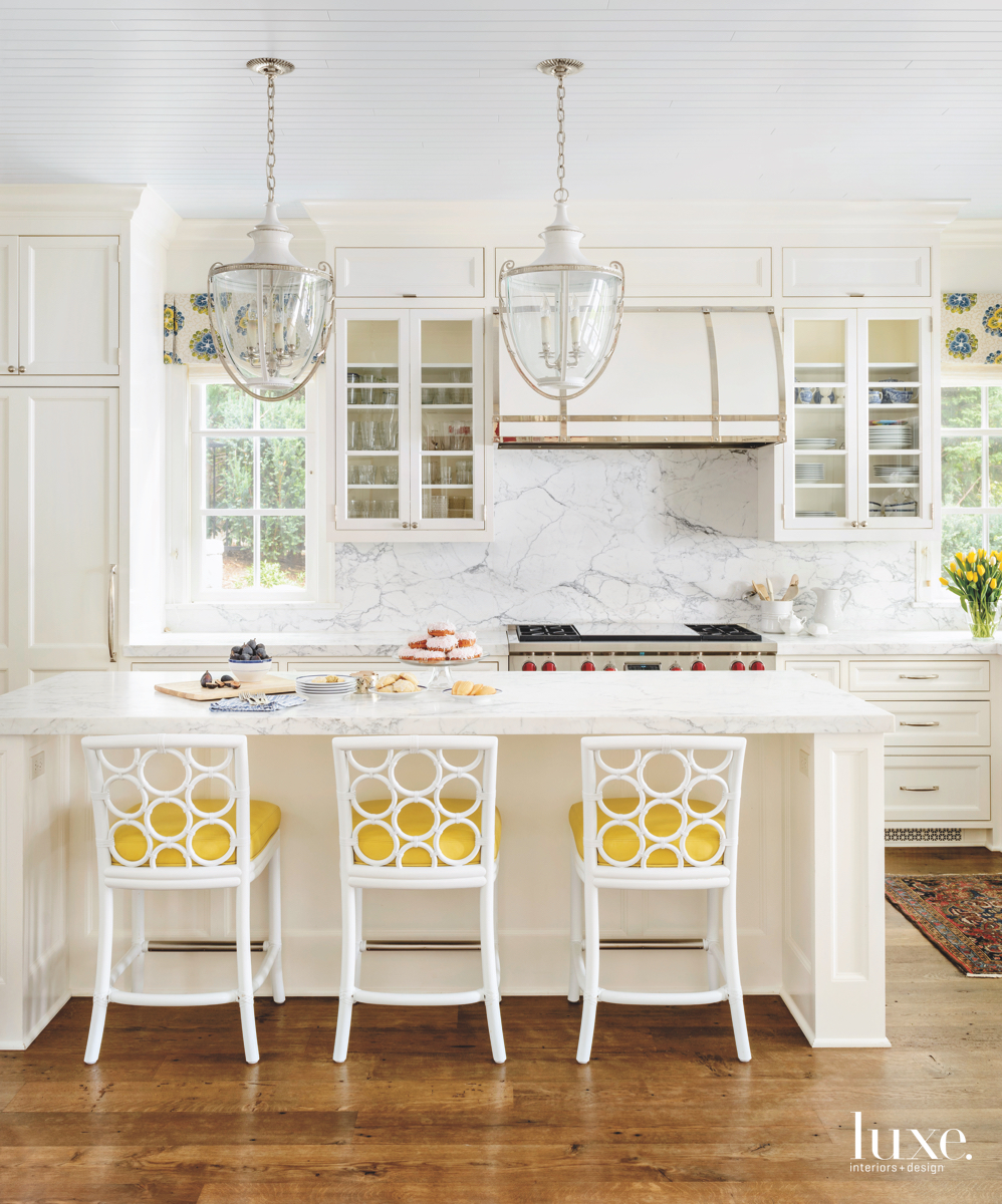 traditional white marble kitchen yellow accents