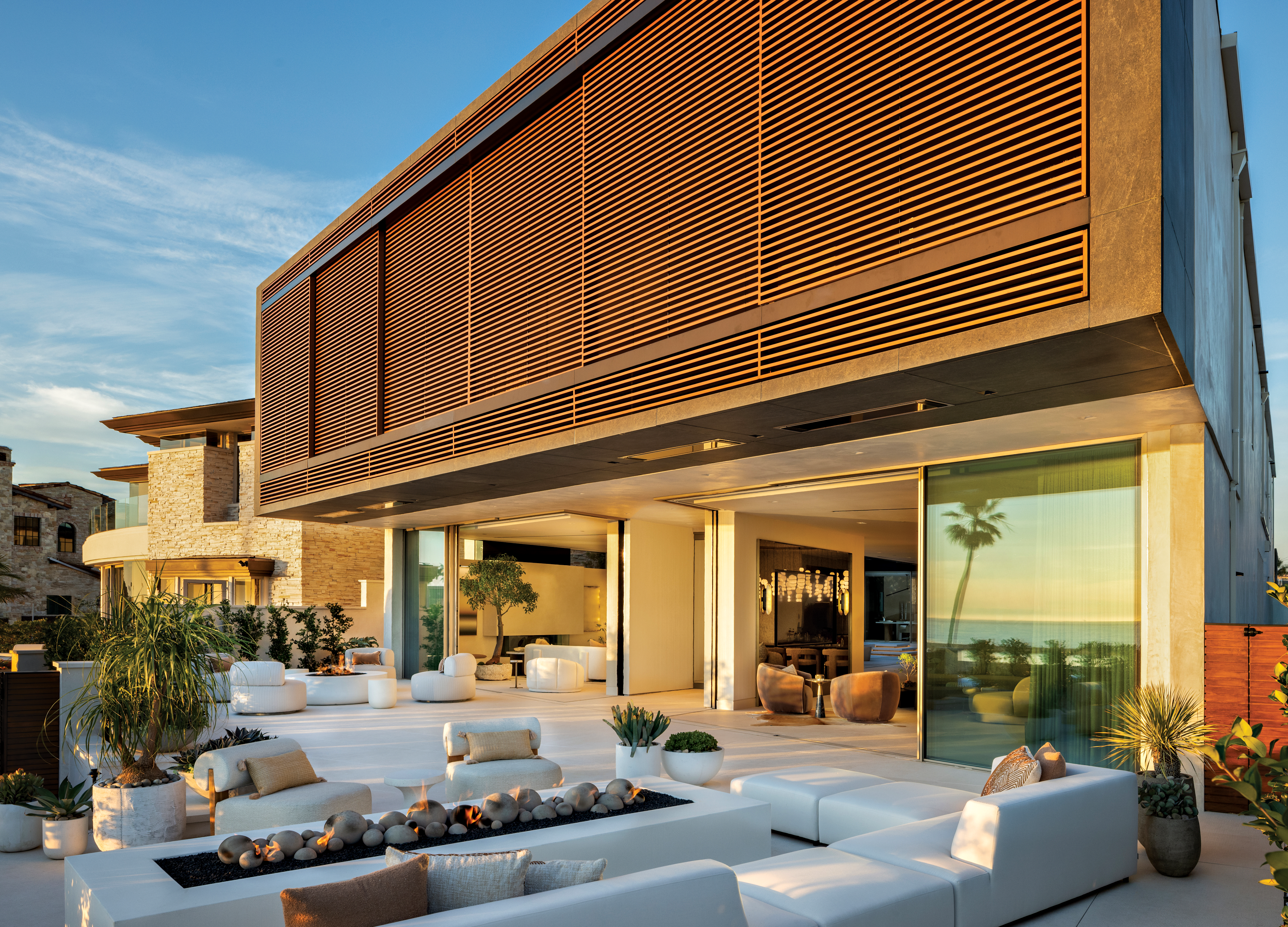 Exterior facade of the home showcasing modern architectural lines with large windows closed.