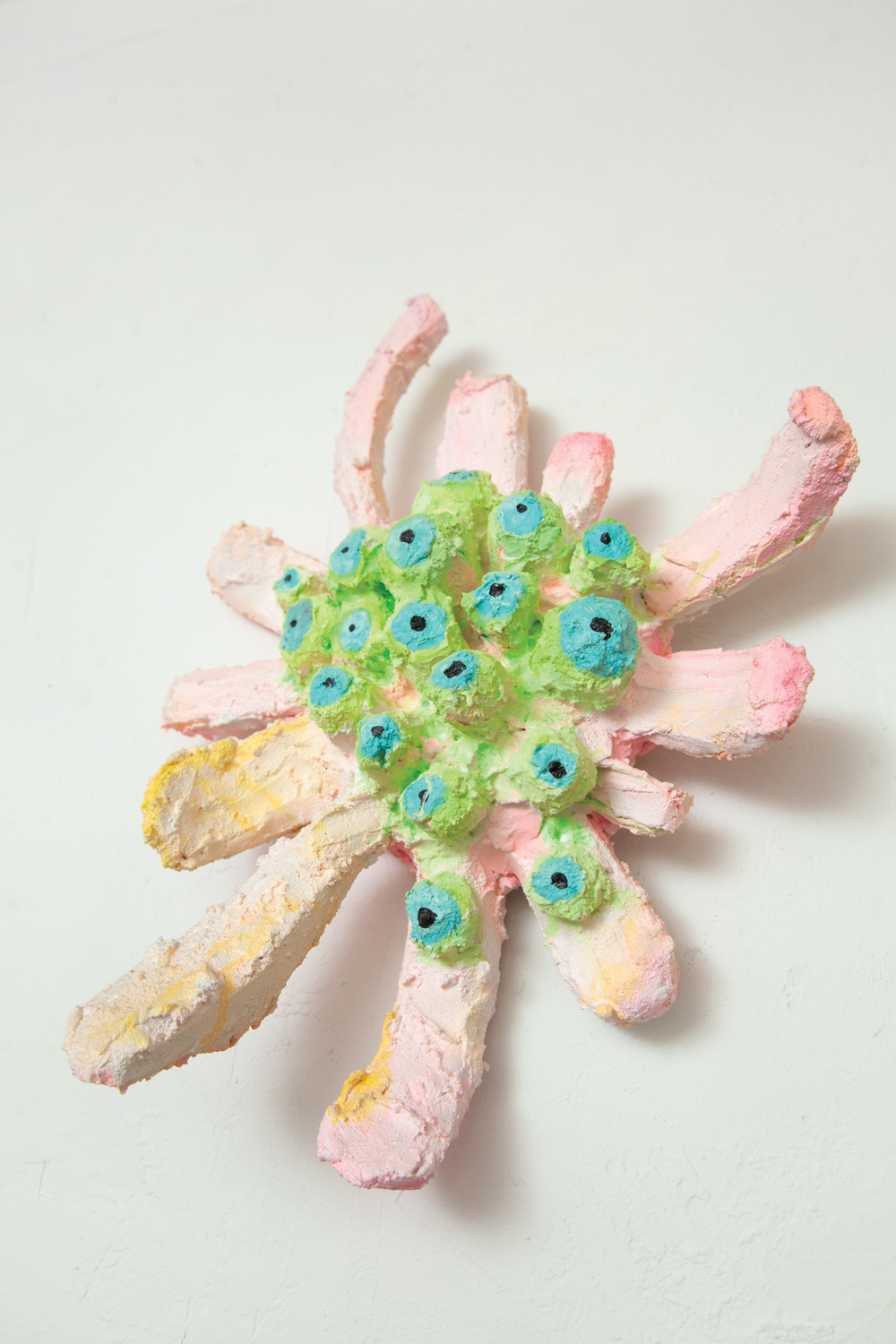 Pink, blue and green floral styrofoam sculpture