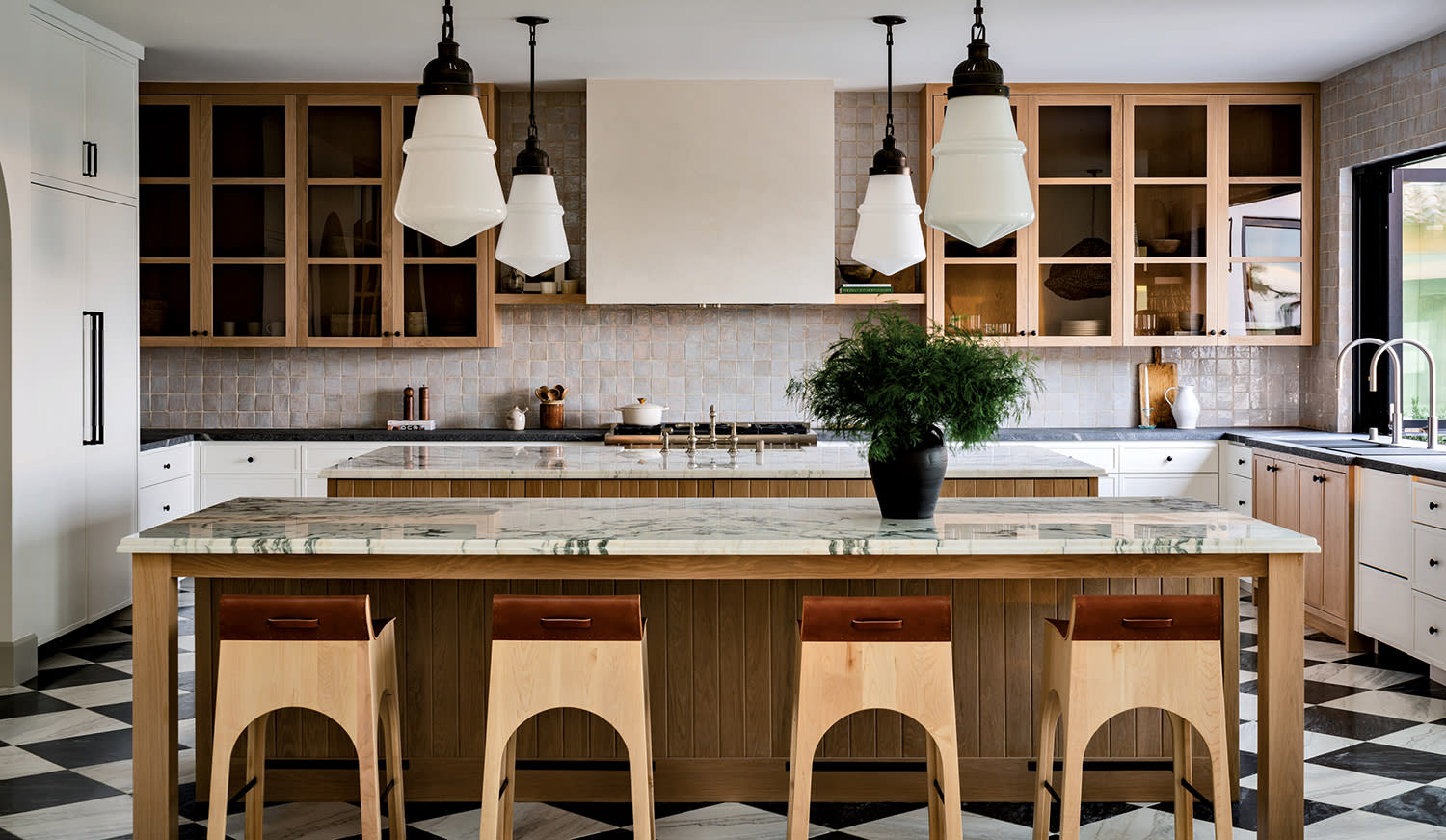 Spanish Revival kitchen with checkered marble flooring