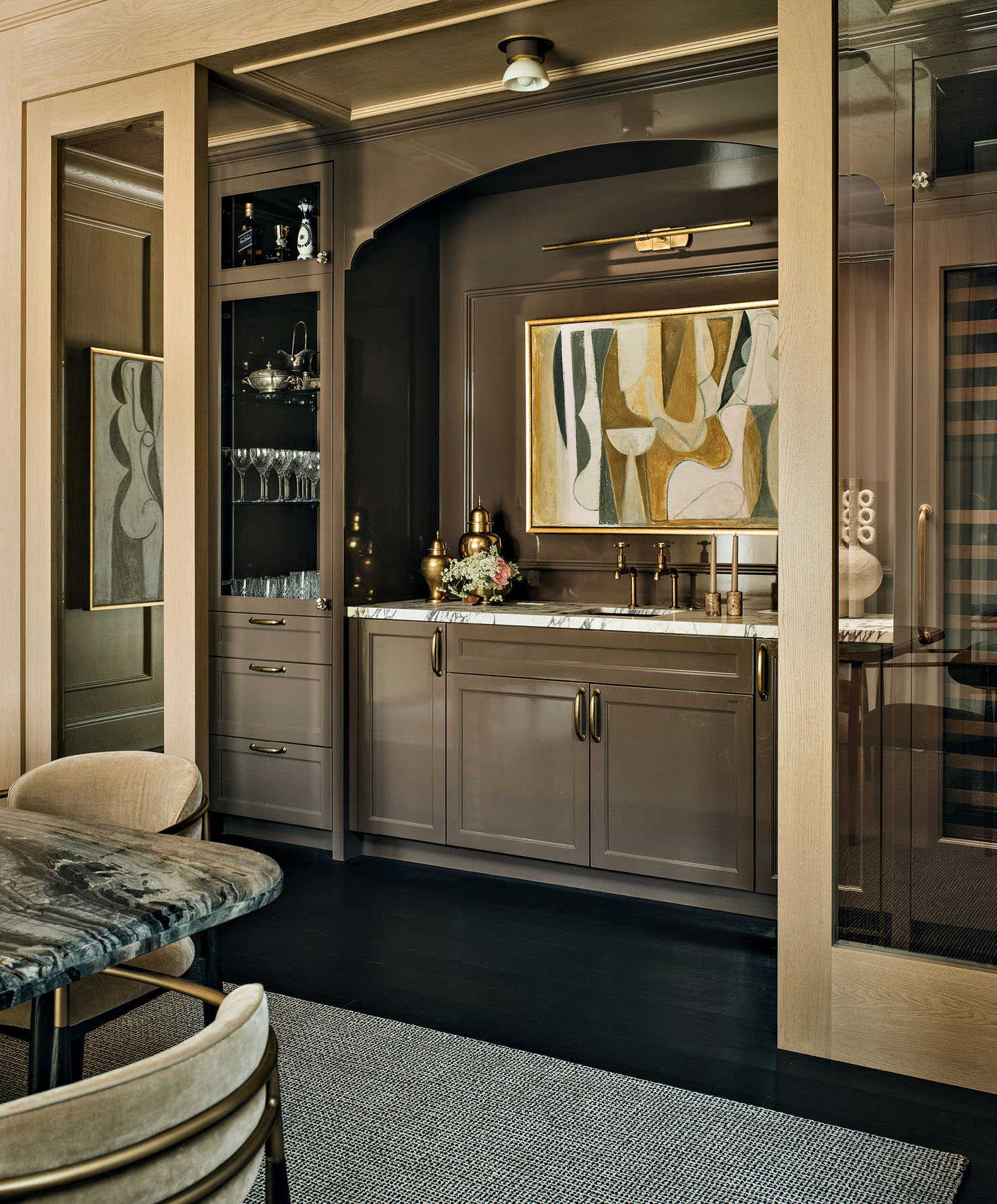 brown and gold web bar in a European-inspired Chicago home