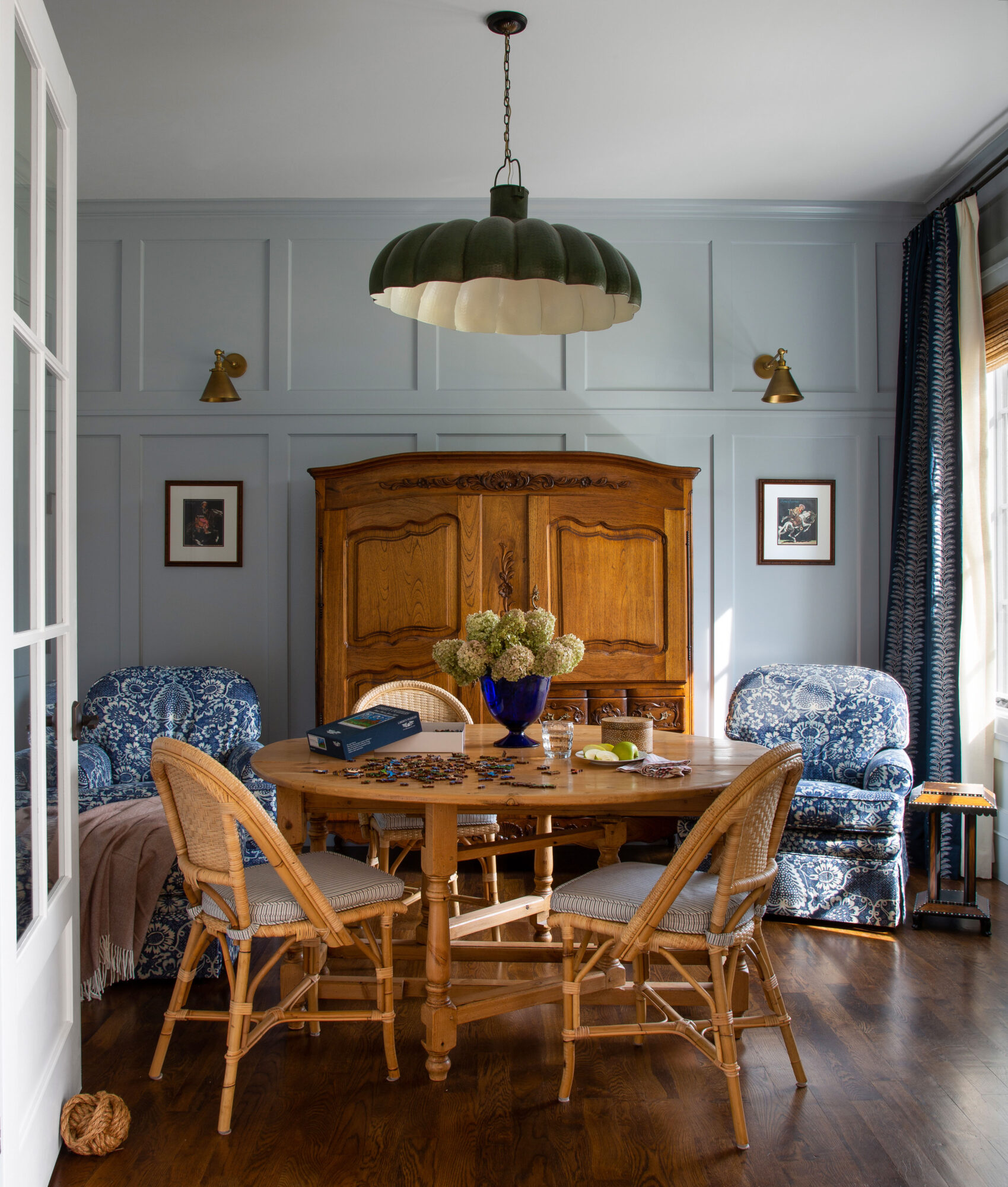 A gray-blue sitting area functions as a puzzle room.