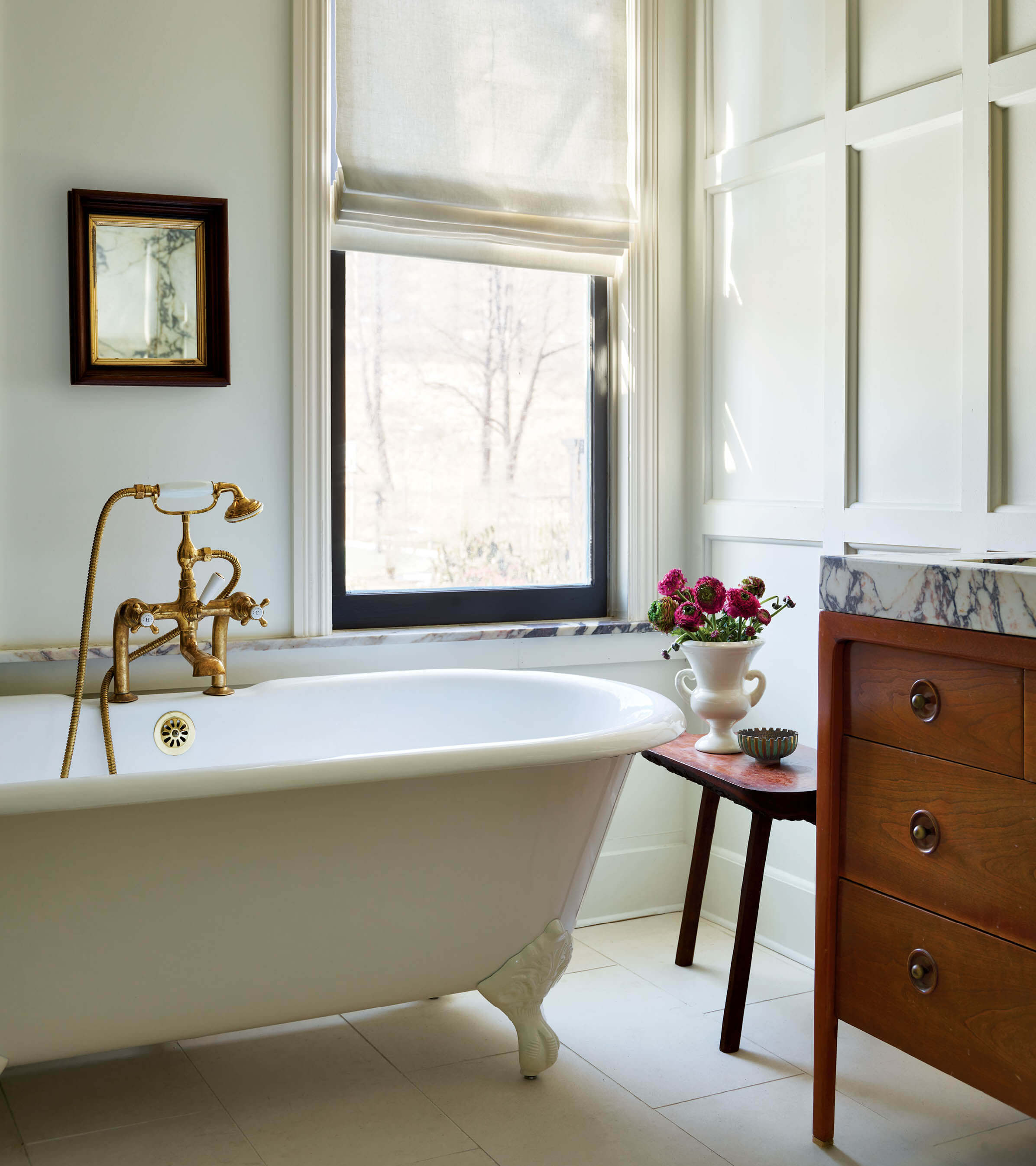 freestanding tub adds a classic vibe to this bathroom