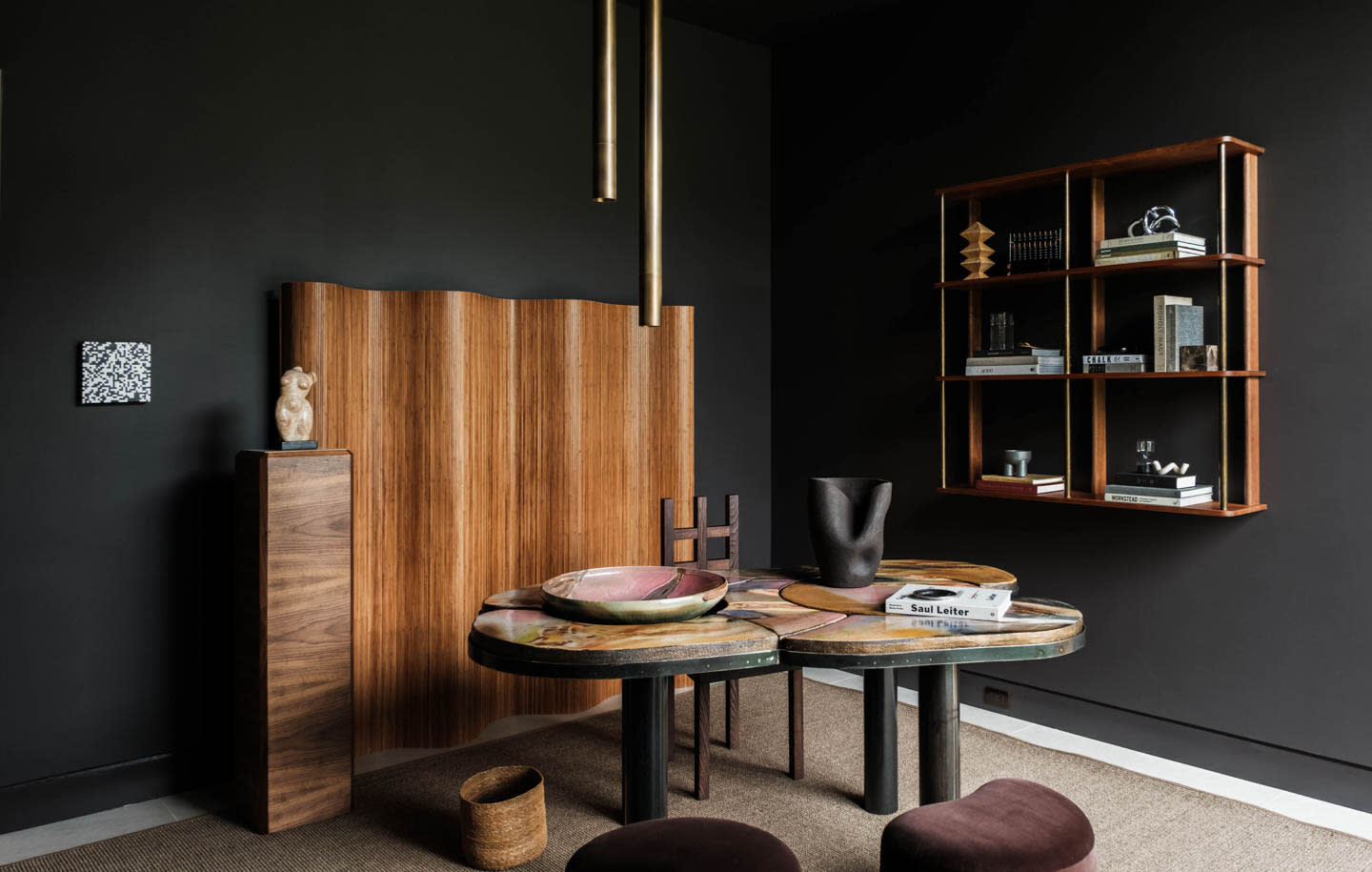 moody black home office with wood features