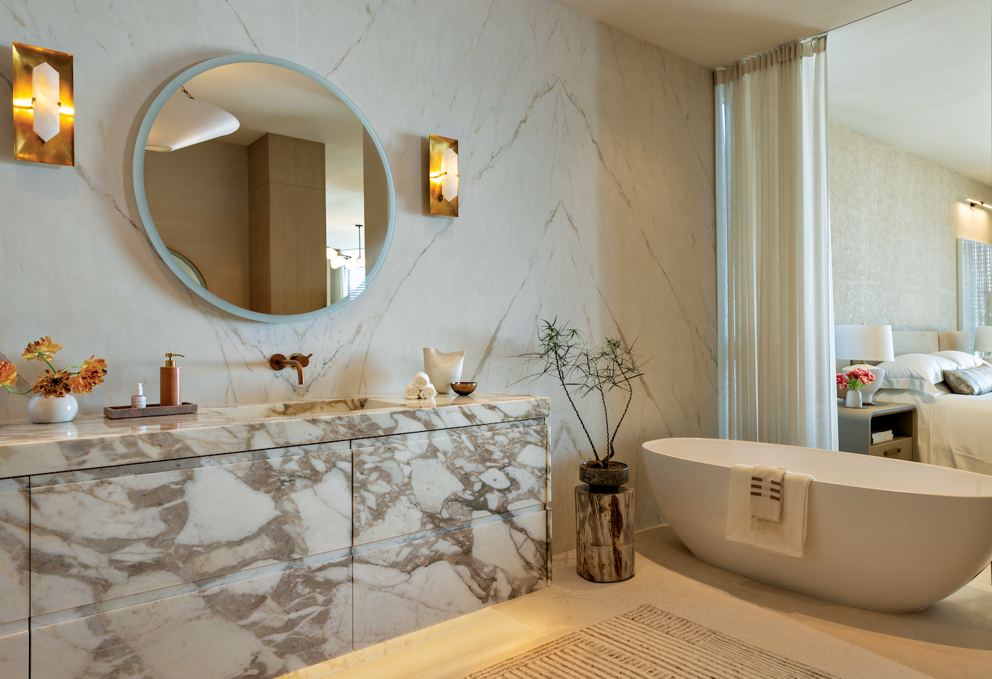 Primary bathroom with freestanding luxury soaking tub overlooking the ocean.