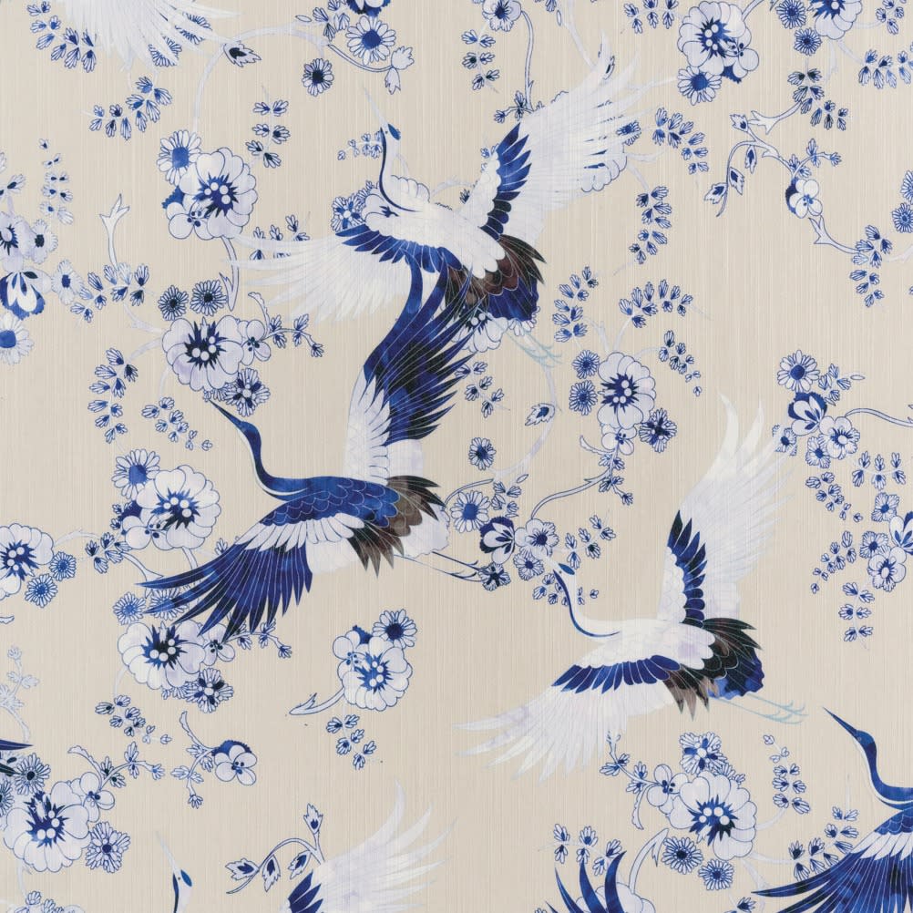 wallcovering depicting a crane in flight surrounded by blue florals