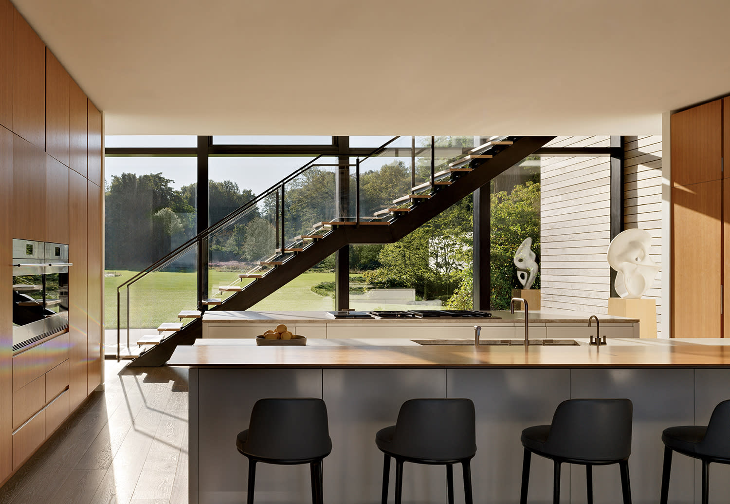 contemporary kitchen with walnut cabinetry