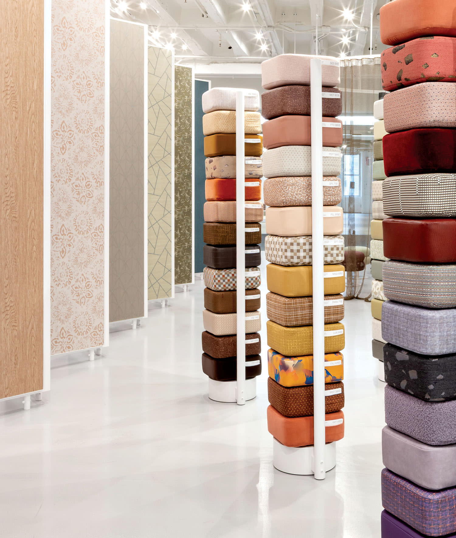 stacks of upholstered cushions at Wolf Gordon's showroom in Chicago