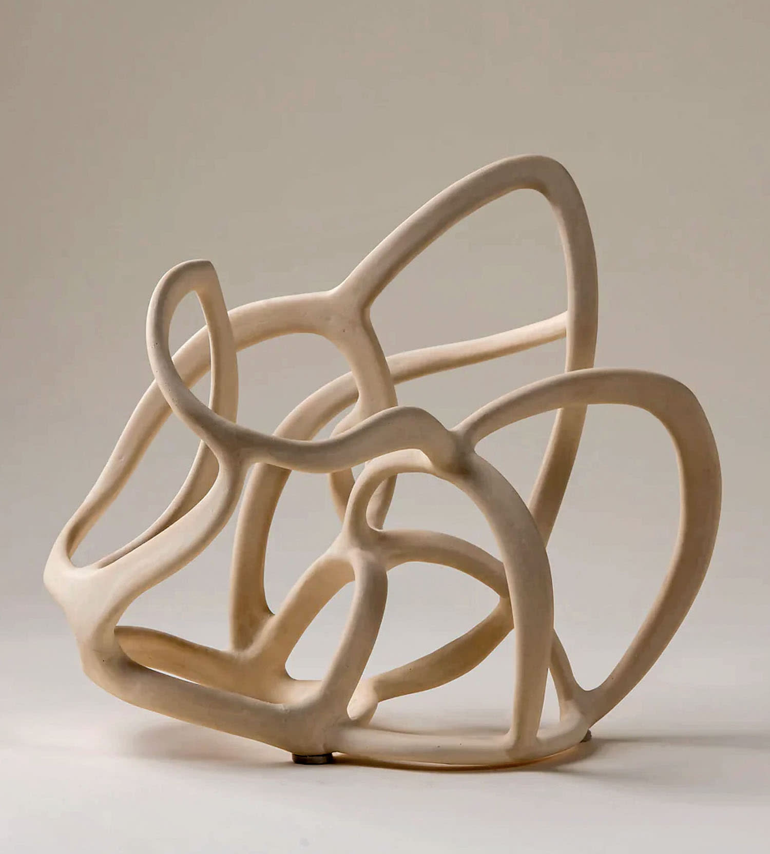 An angular sculpture with loops overlapping one another.