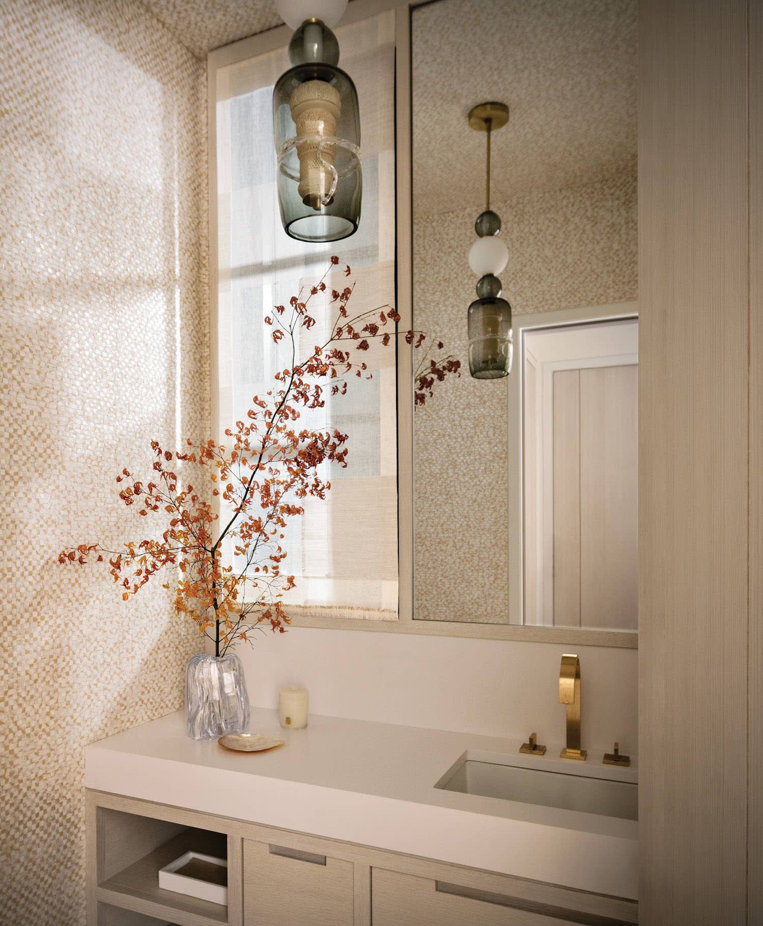 soft, light powder room in pale pink and beige tones