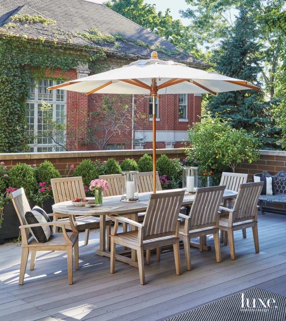 wood outdoor table with umbrella