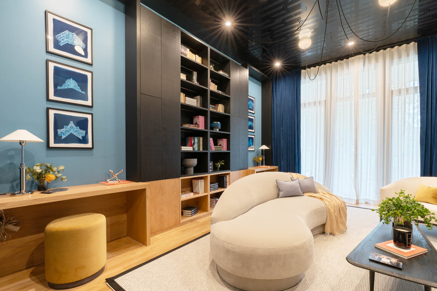 contemporary blue home library at aspire design + home showhouse