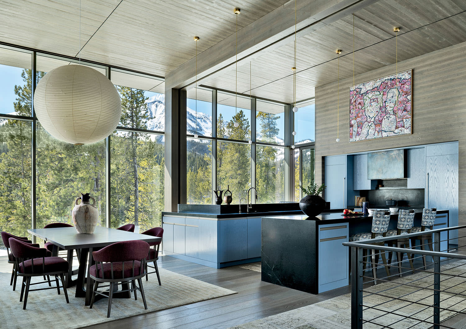 great room with 15-foot-tall ceilings of hemlock paneling and floors of French oak