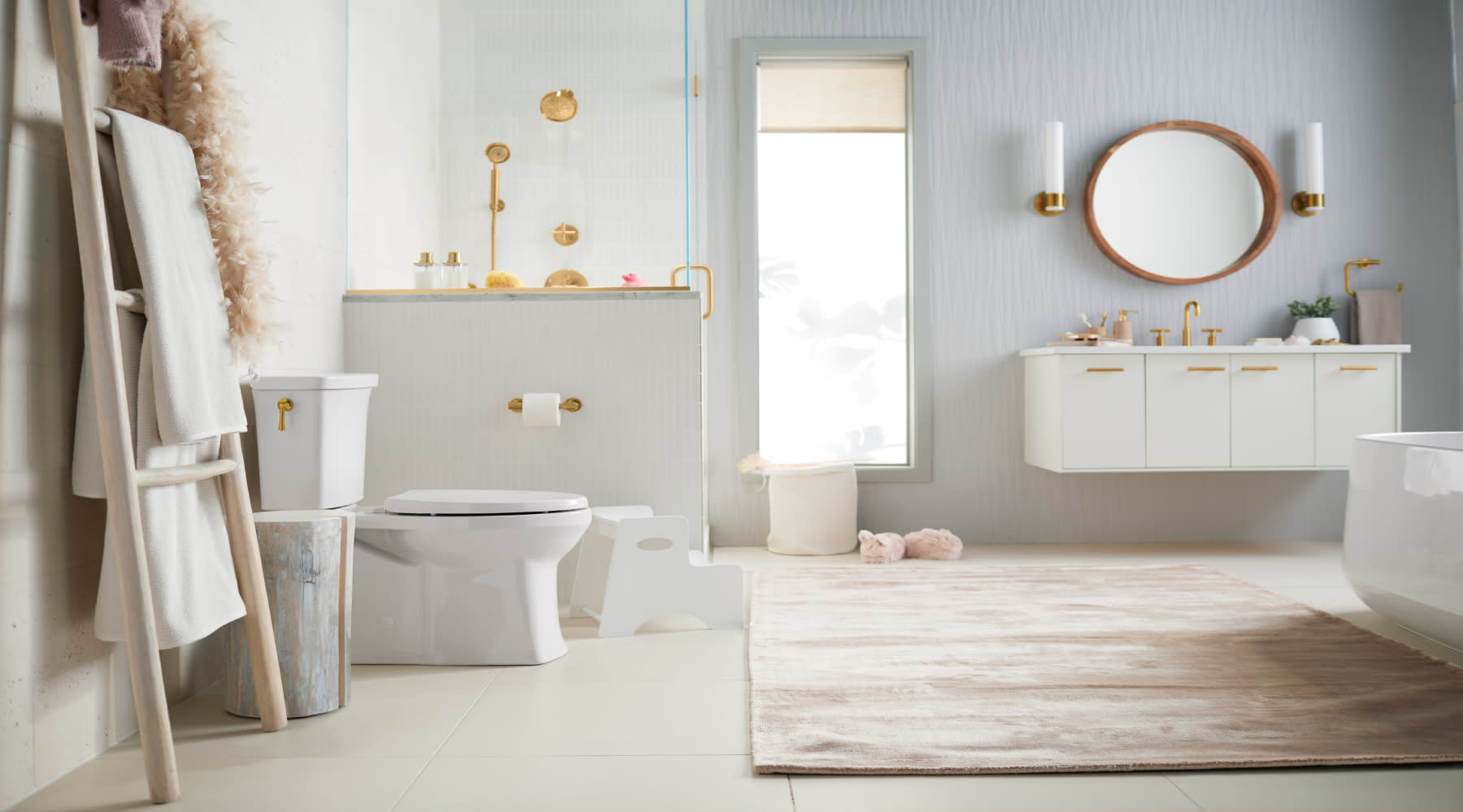 Simple bathroom design showcasing a white toilet, sink, and bathtub, creating a spacious and tidy atmosphere.