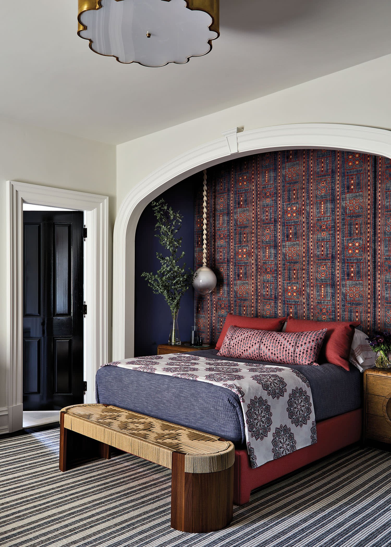 bed set into a niched archway in an elegant Greenwich, Connecticut home