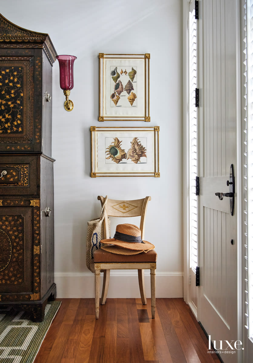 foyer with antique chair