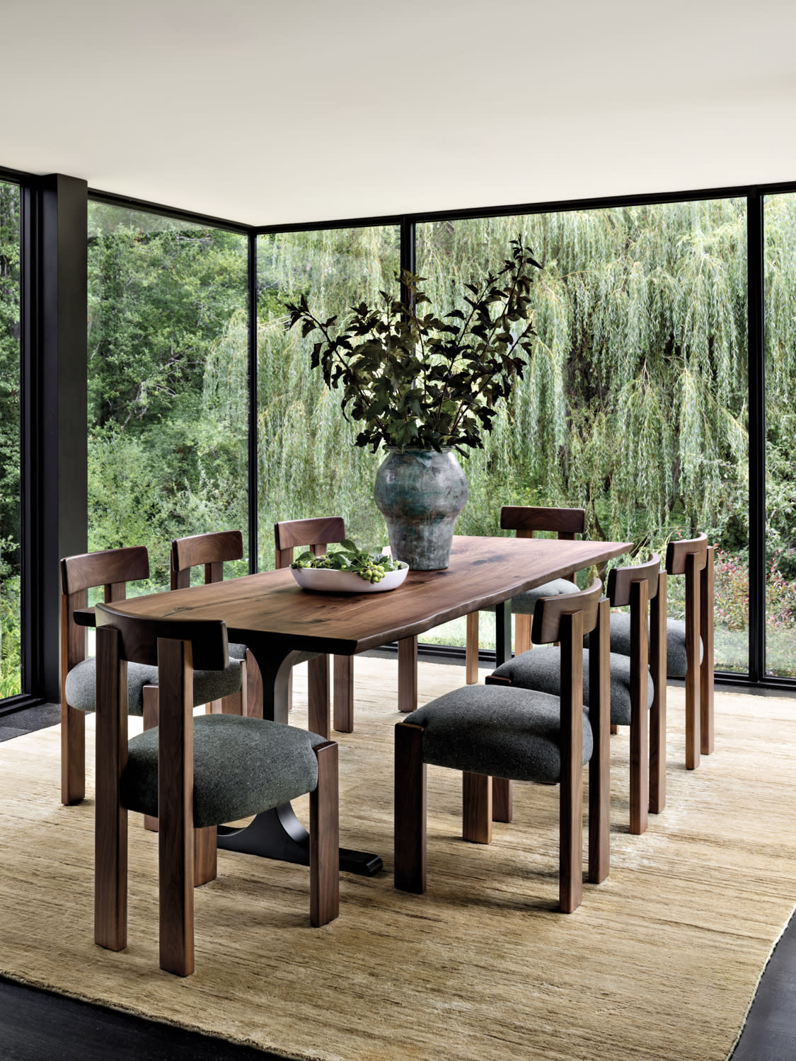 compact modern dining room that feels like a floating greenhouse