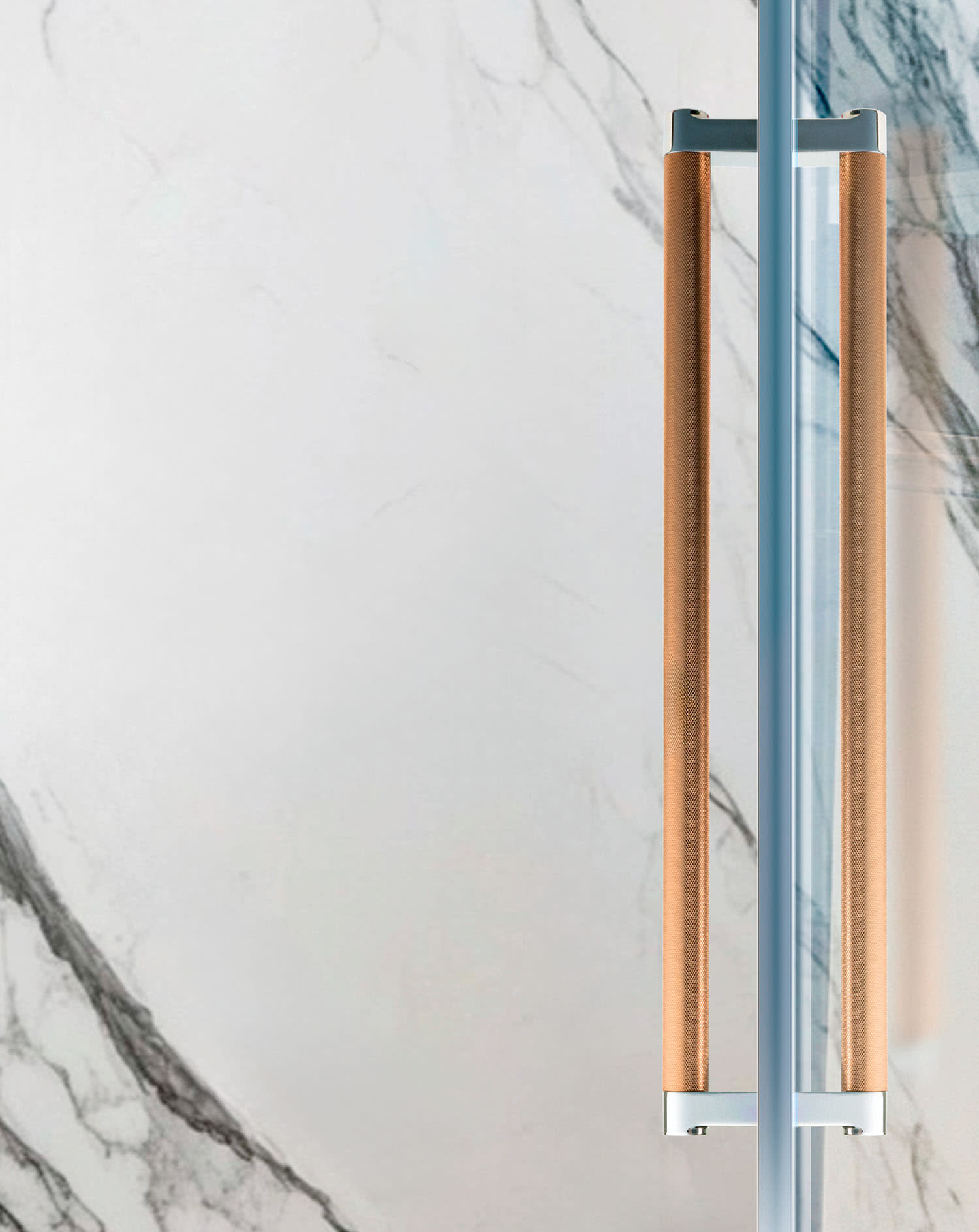 Pulls for a shower door made with a nickel base with copper accents.