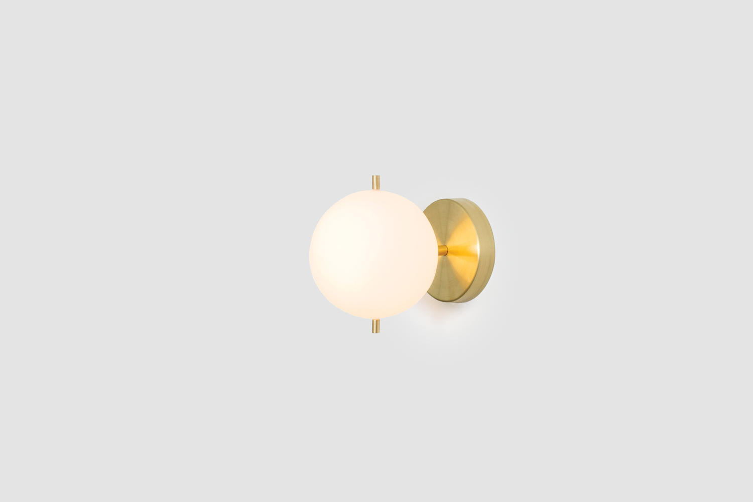 globe brass sconce