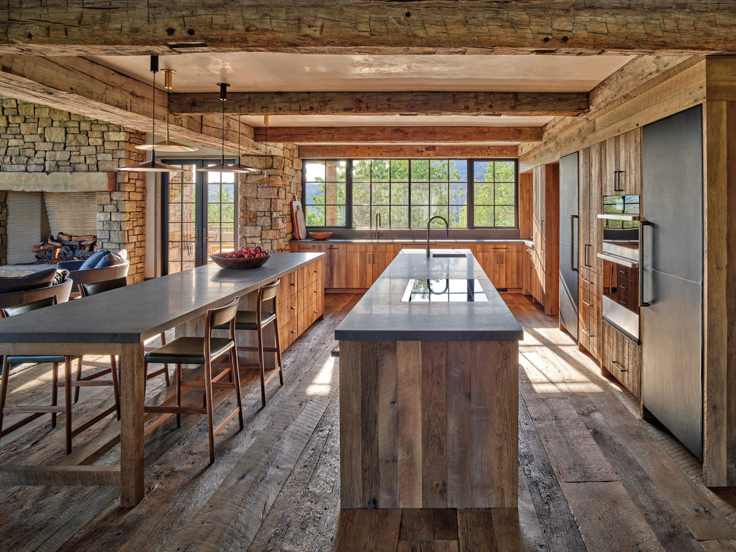 A stylish kitchen with a generous island and a stove, providing ample space for cooking and socializing.