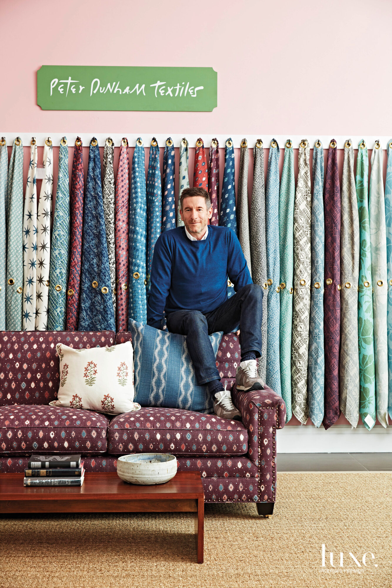 Peter Dunham in front of fabrics