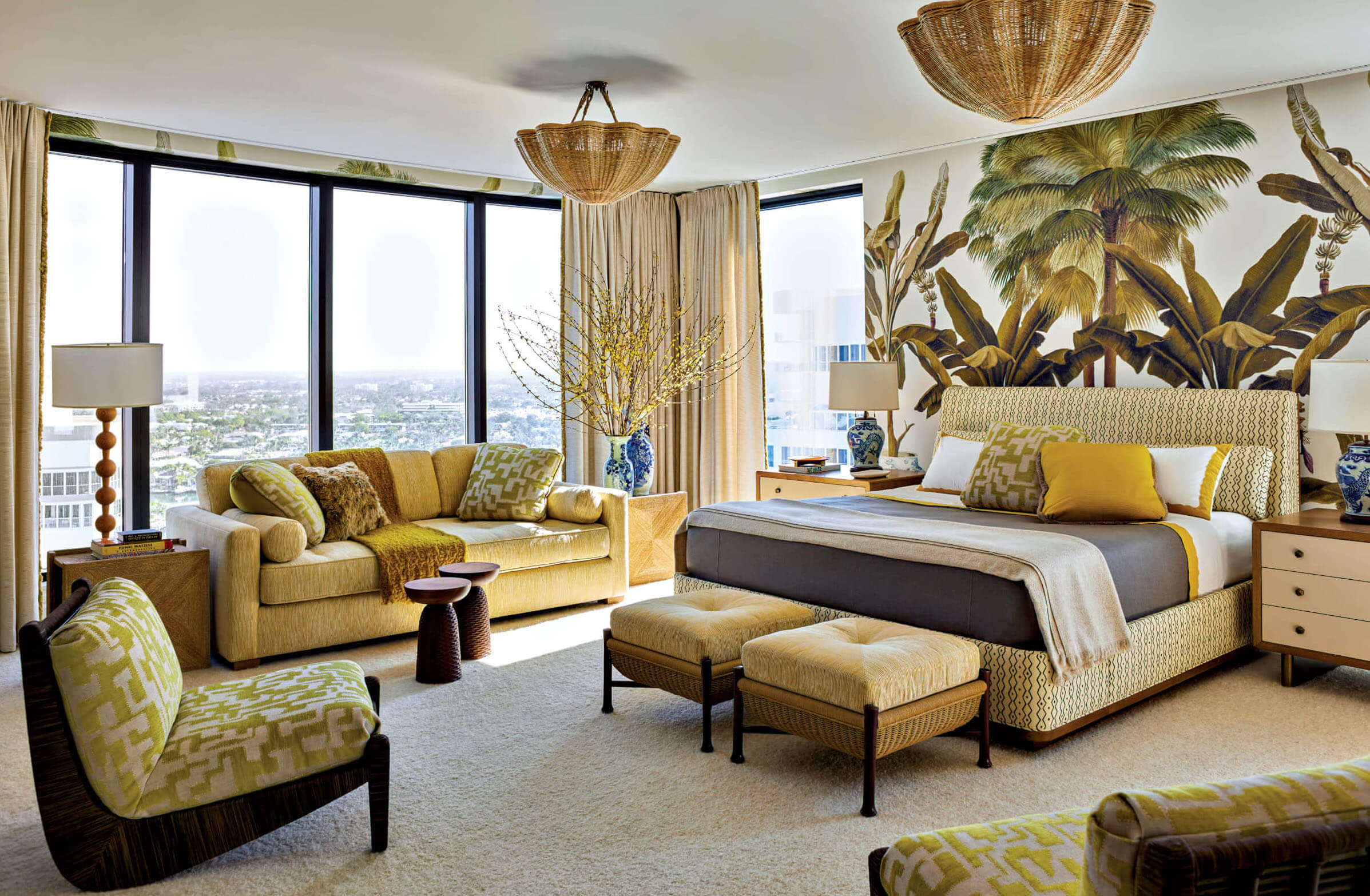 guest suite with tropical wallpaper and colorful furnishings 