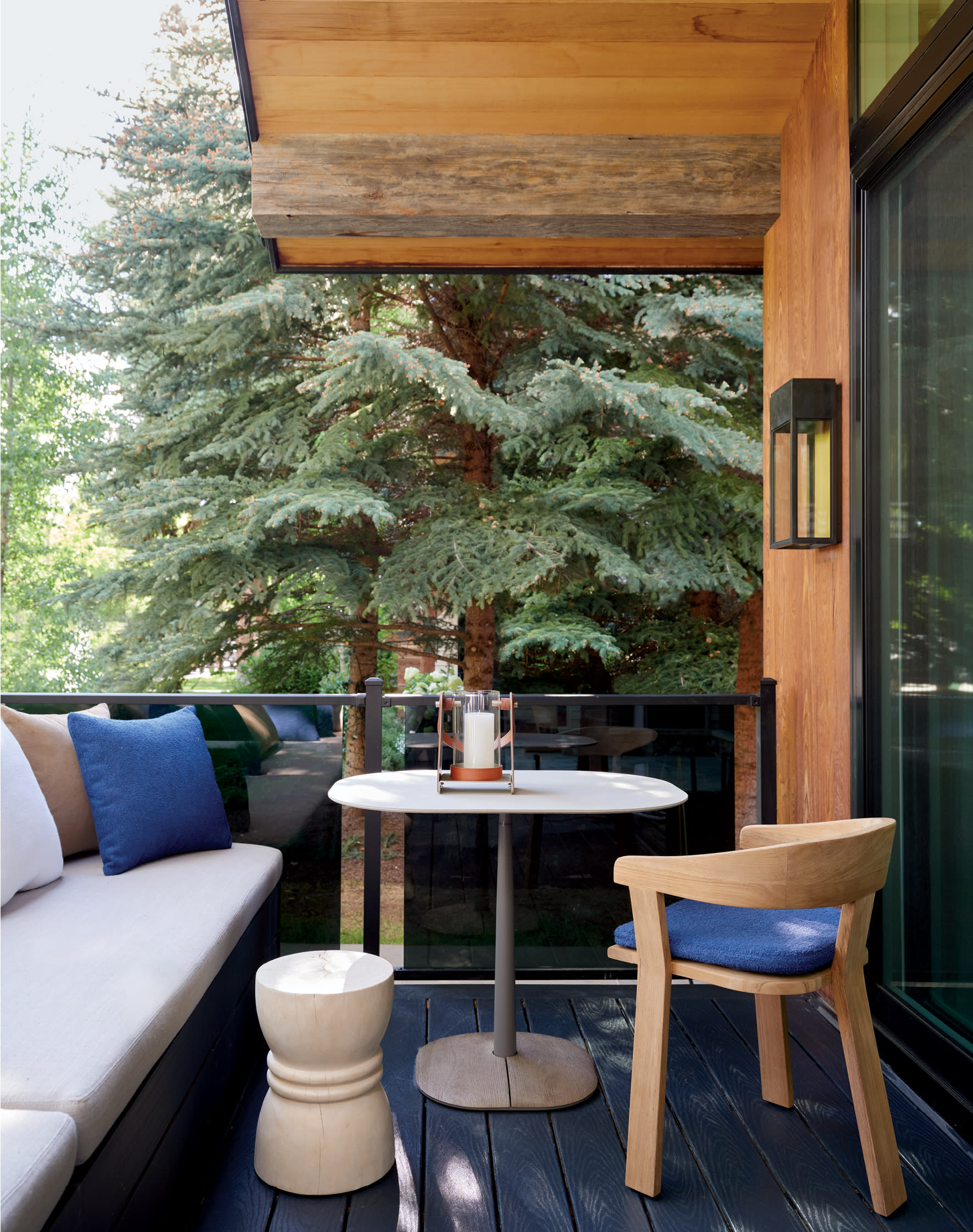 deck of an Aspen home with an outdoor sofa