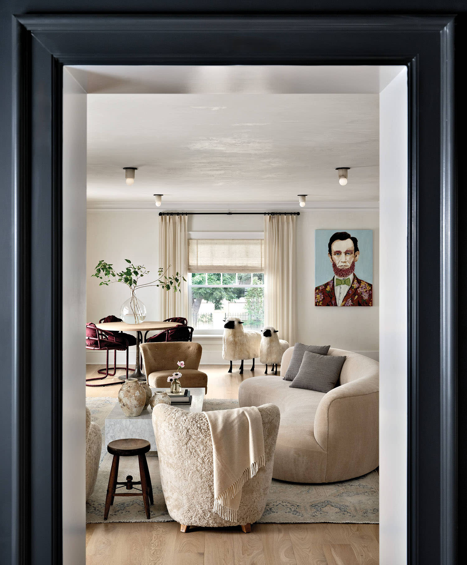classic-meets-contemporary living room viewed through an interior doorway 