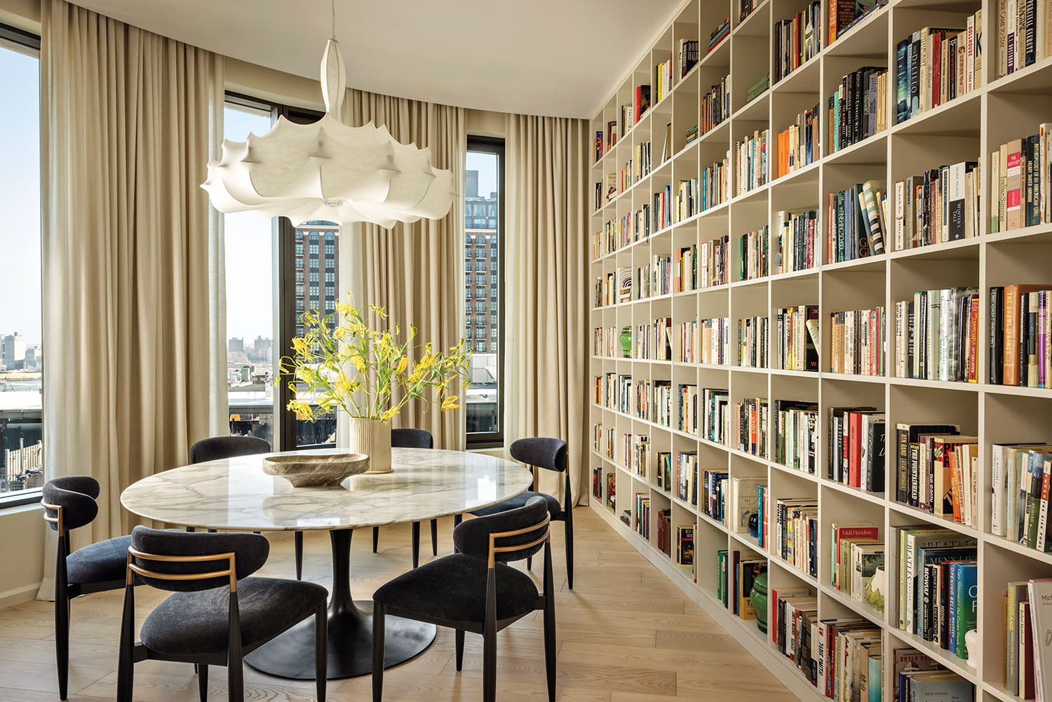 Dumbo apartment's dining room and library