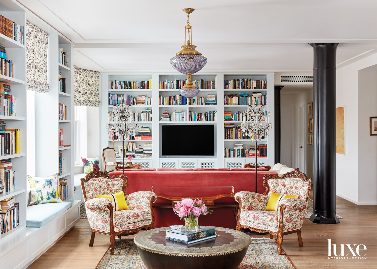 pastel living room with built-in bookshelves