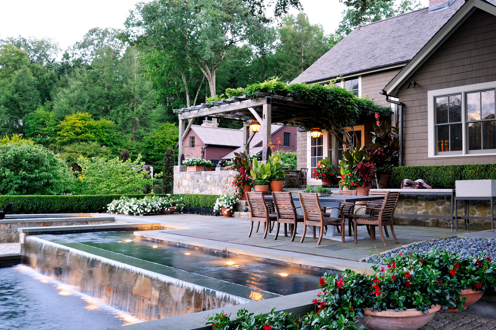 Backyard entertaining area at dusk