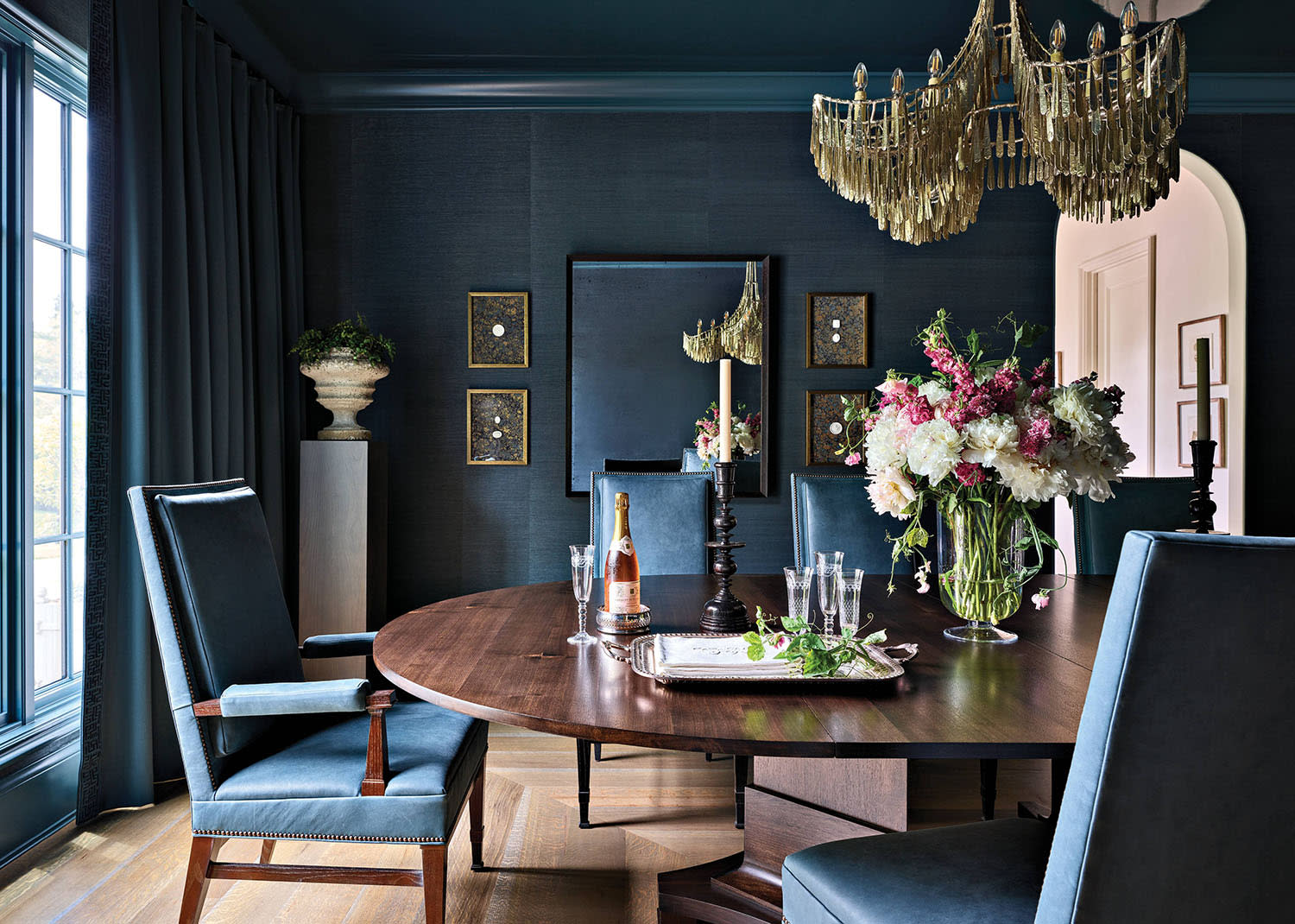 blue dining room with matching chairs