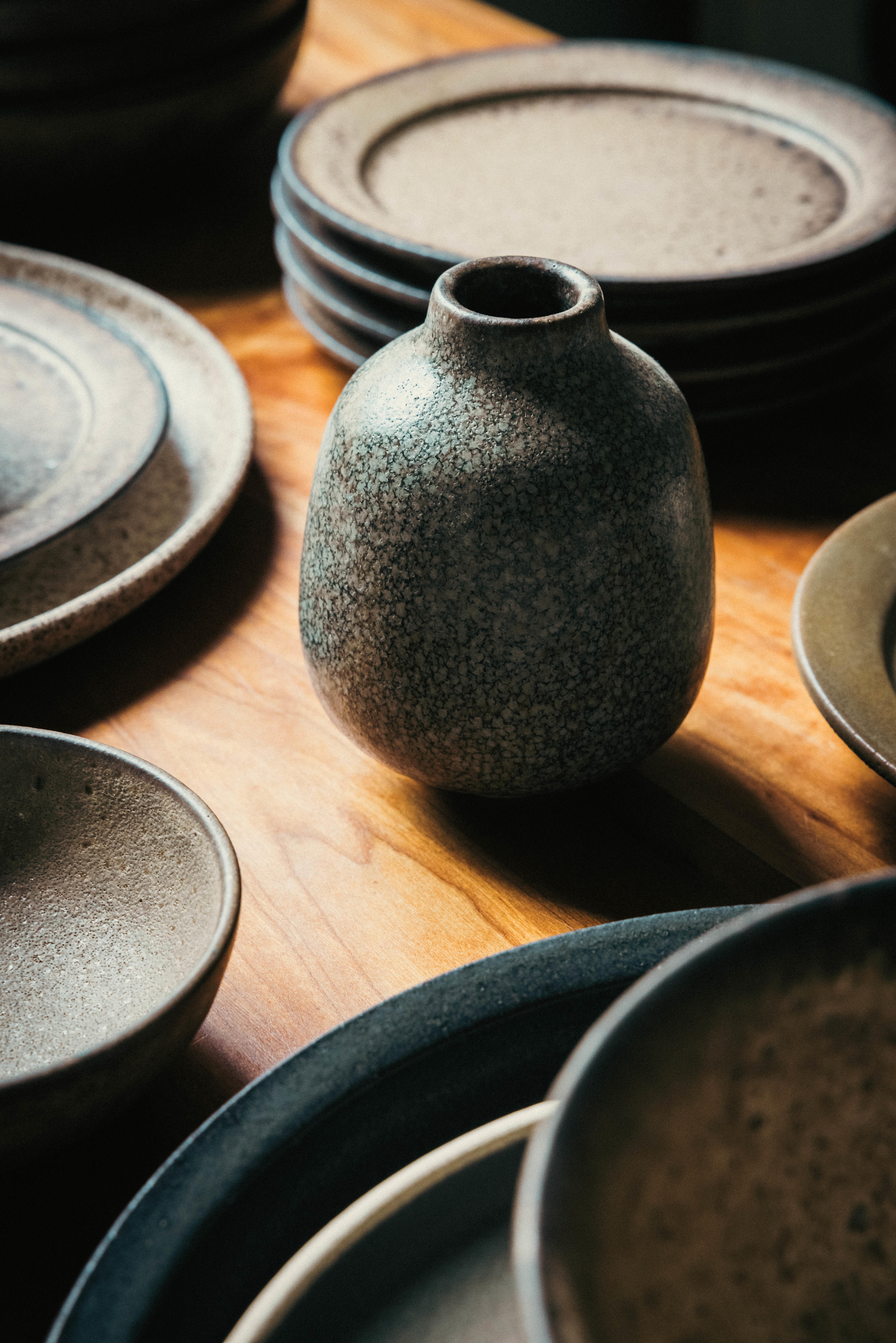 vases and plates by Era Ceramics