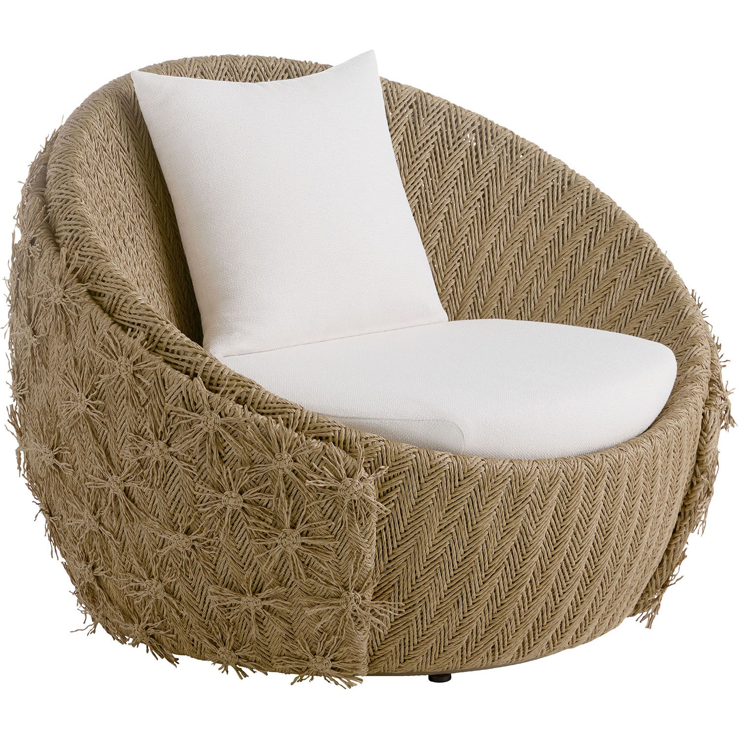 A round, woven chair with a textured brown herringbone pattern features a plush white cushion and pillow, conveying a cozy and inviting atmosphere.