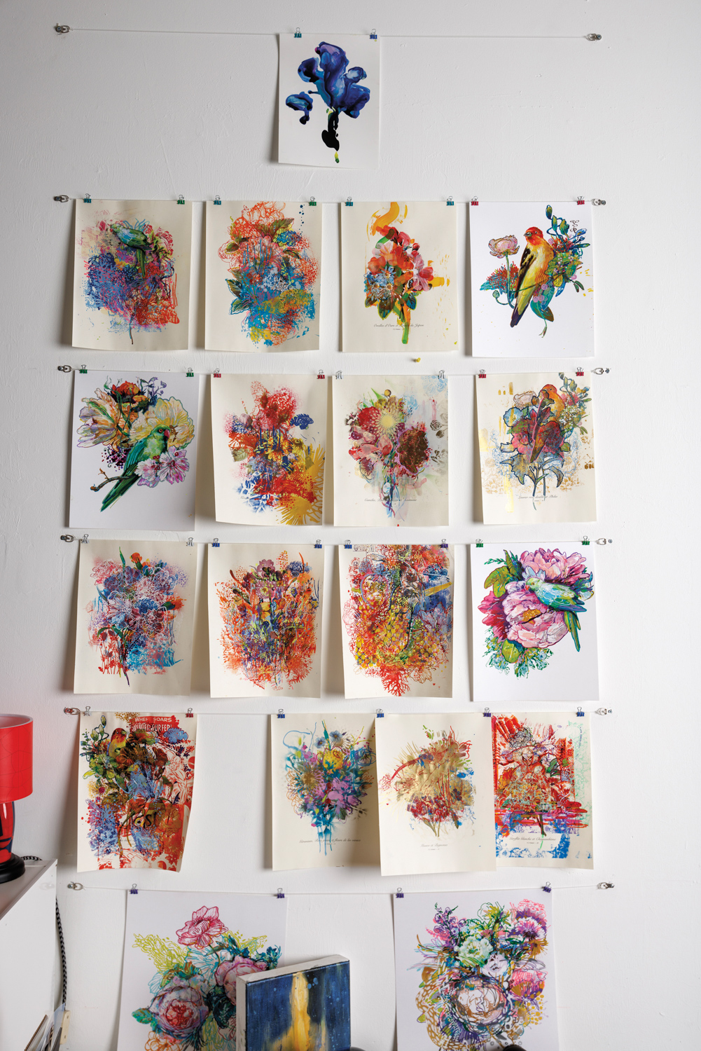 gallery wall of smaller flower portraits by carmelo blandino