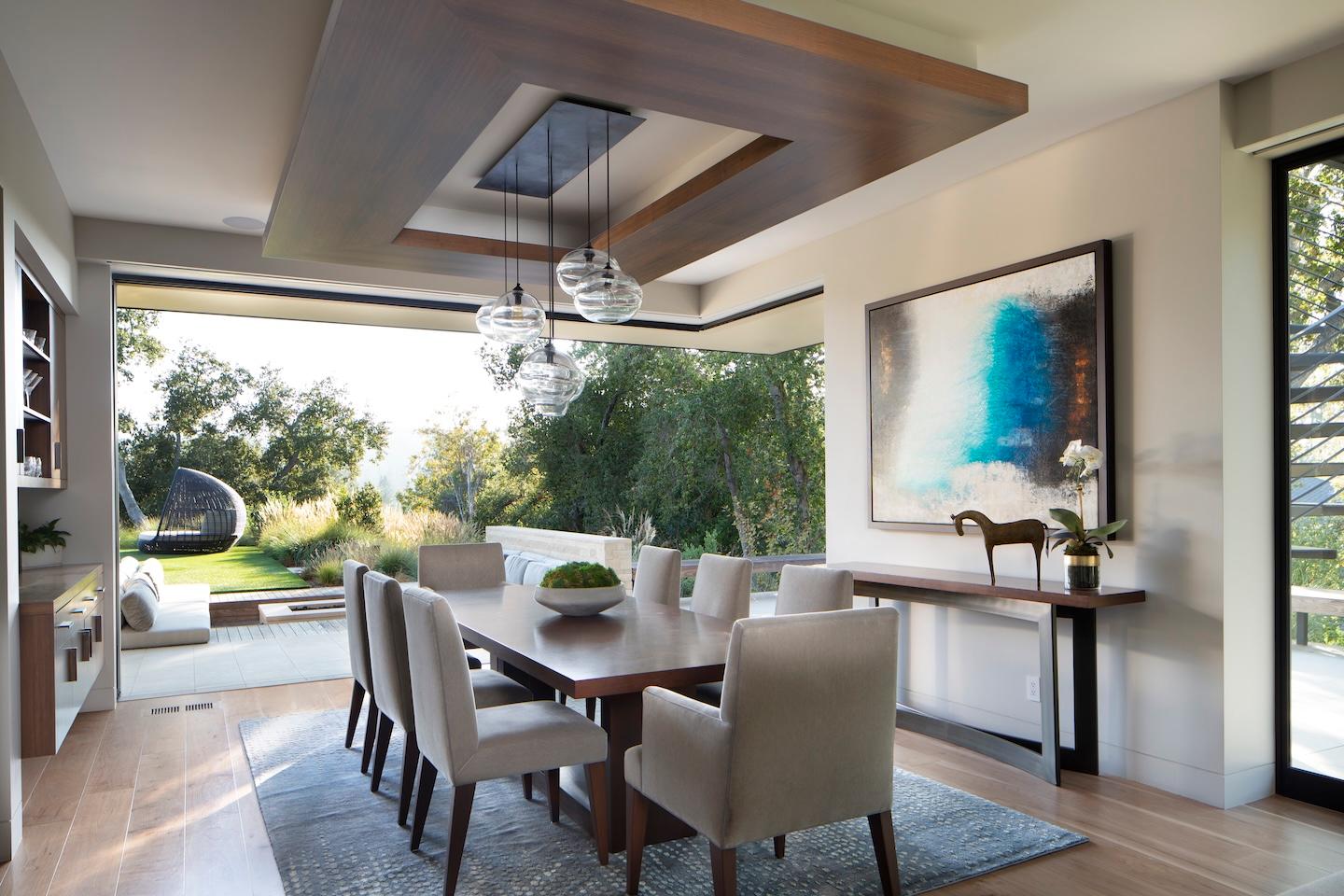 Wooden ceiling with modern chandeliers built by Conrado Home Builders.