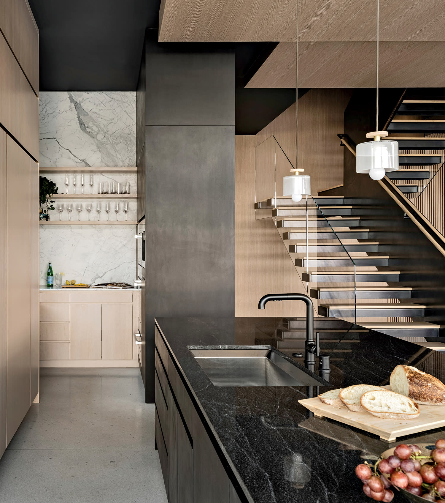 dark granite kitchen island in a modern home