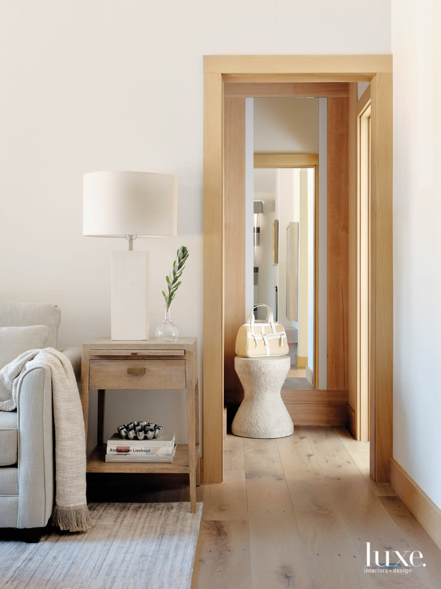 A guest bedroom is done in neutral tones.