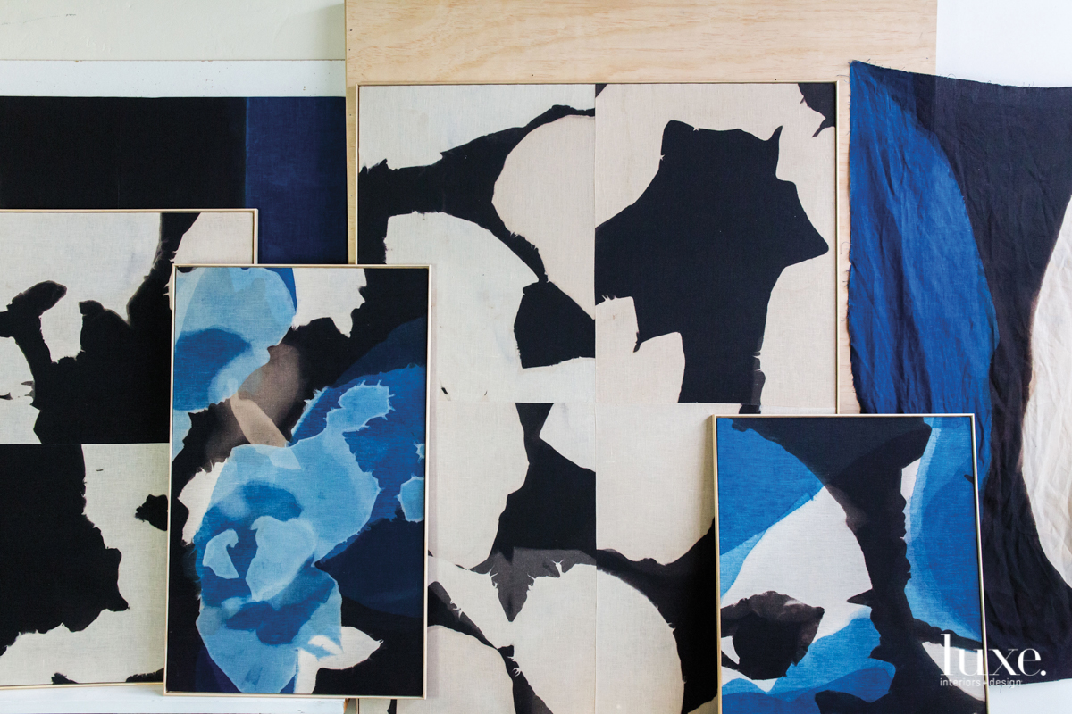 When dry, the cloth is stretched over a wooden frame to create a painterly work of art.