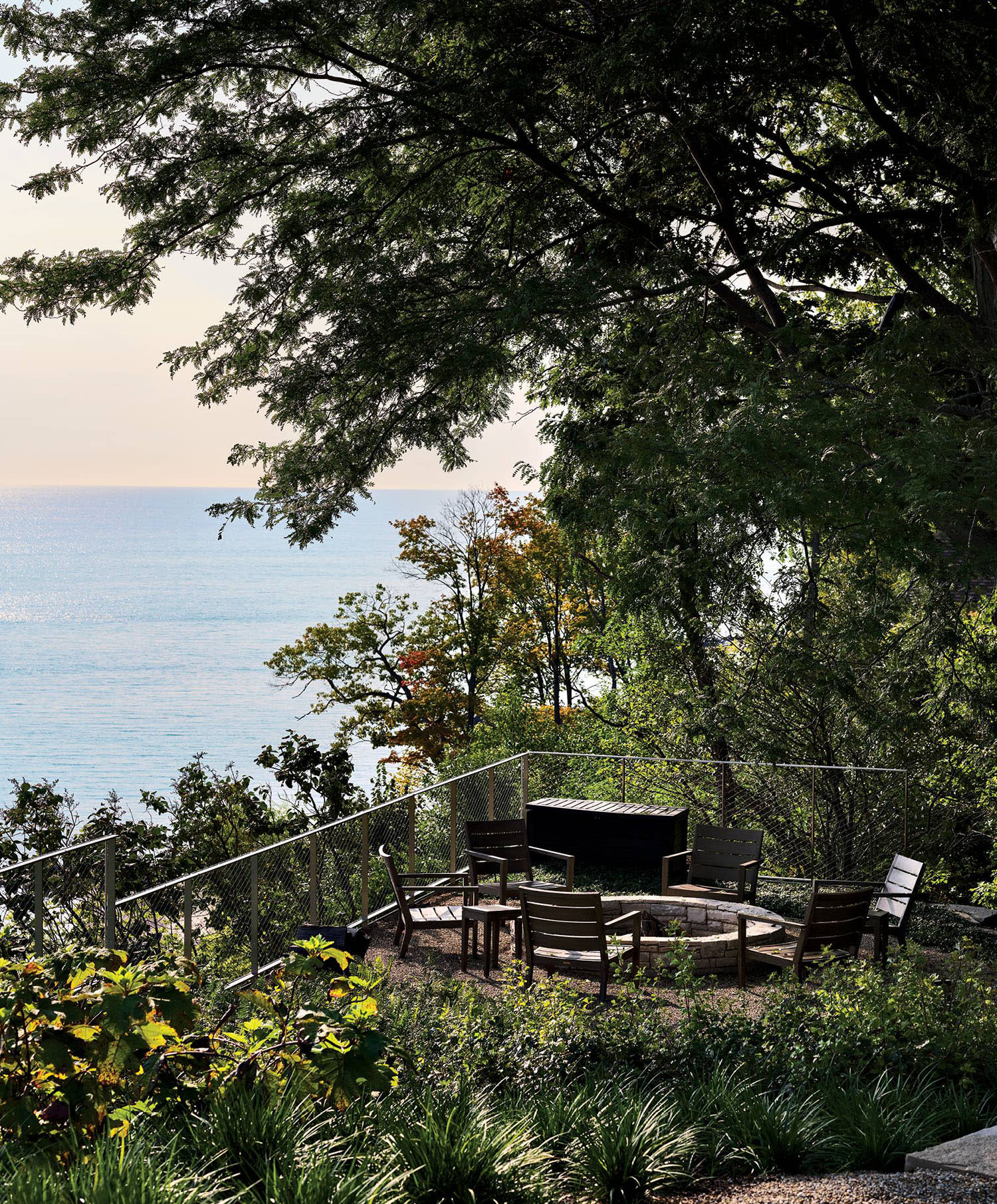 secluded outdoor lounge space on the exterior of a Chicago-area lakeside home
