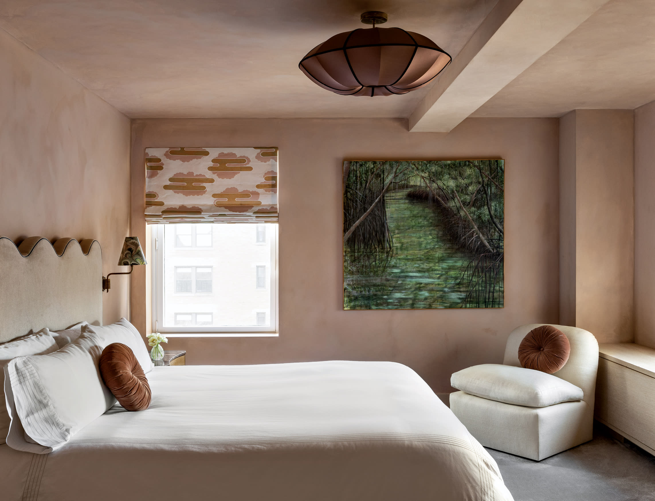 peach-colored primary bedroom in a modern Upper East Side apartment