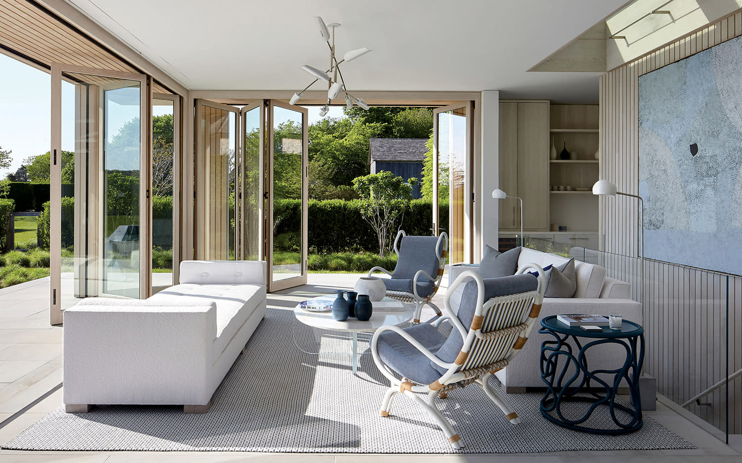 modern pool house living room with neutral furnishings