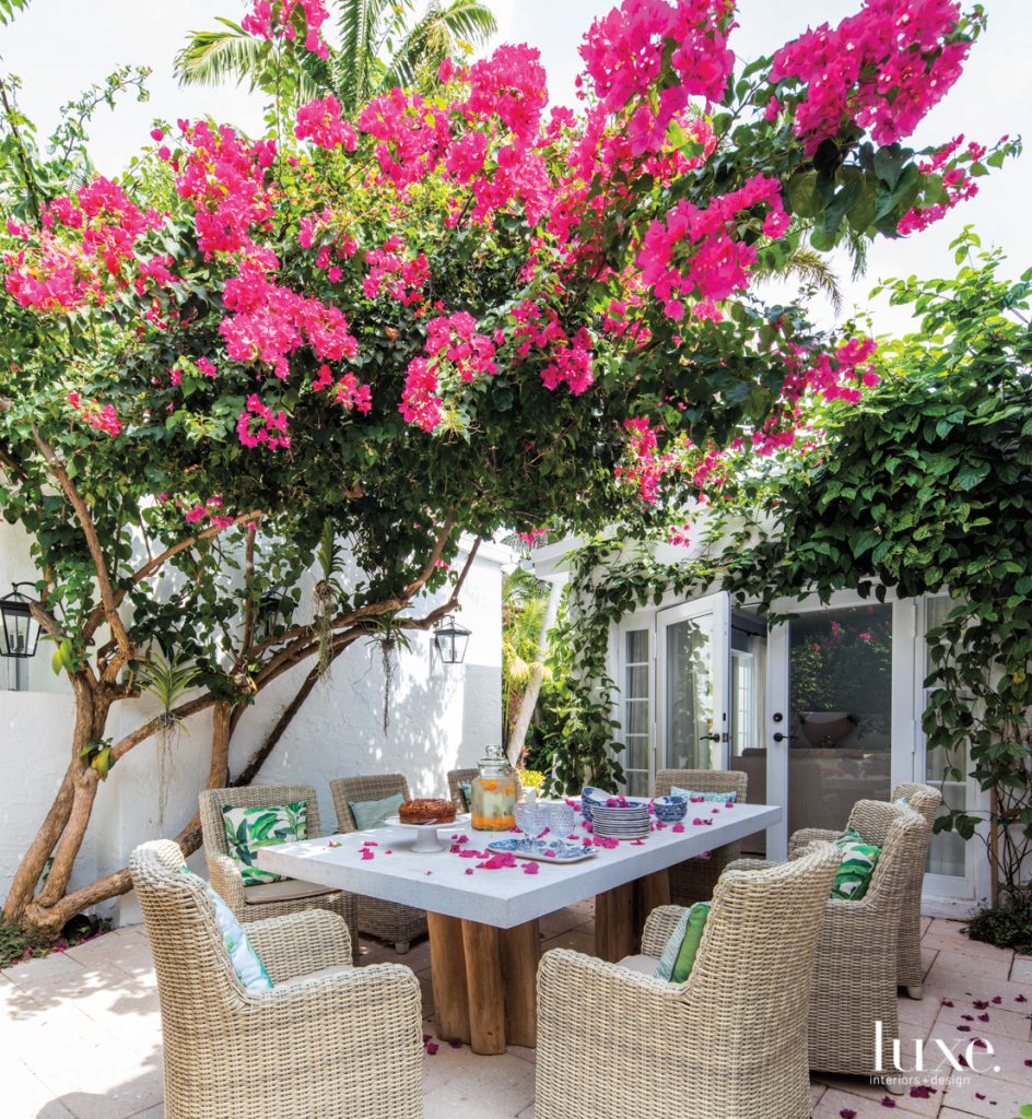 outdoor table with bougainvillea