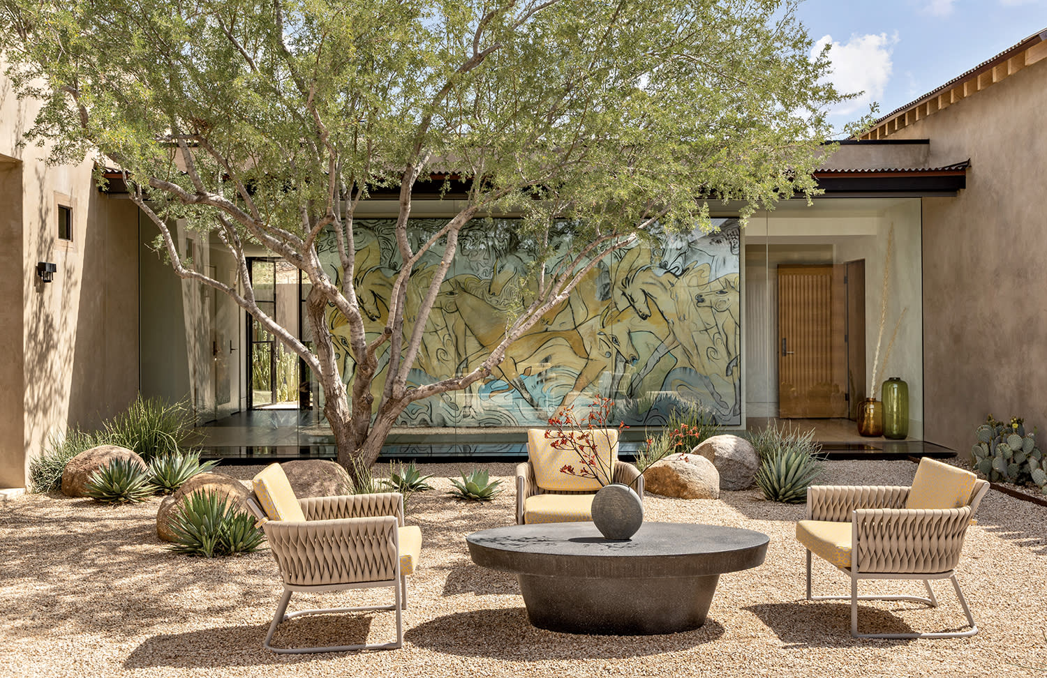 modern, desert-inspired front courtyard of an Arizona home
