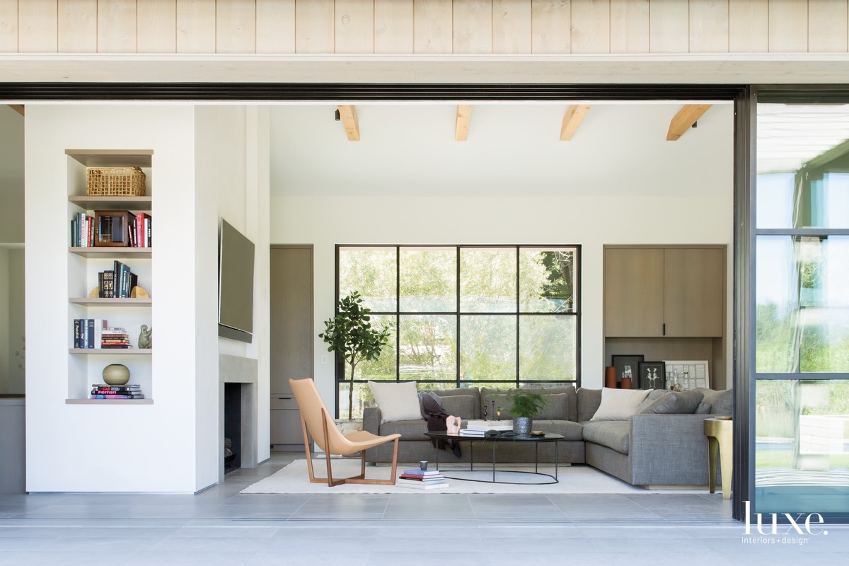 modern living room gray sectional wooden ceiling beams