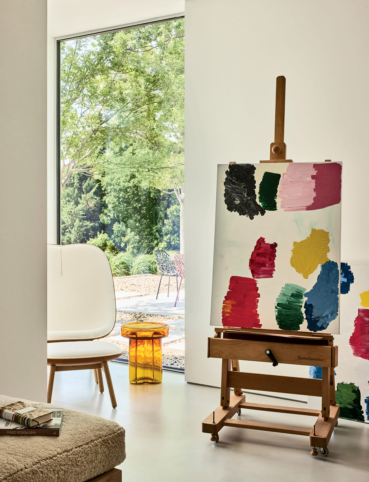 home art studio with a painting on an easel