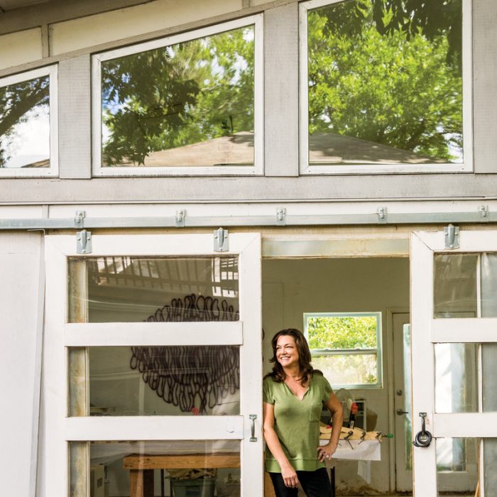 portrait of Caprice Pierucci in front of studio