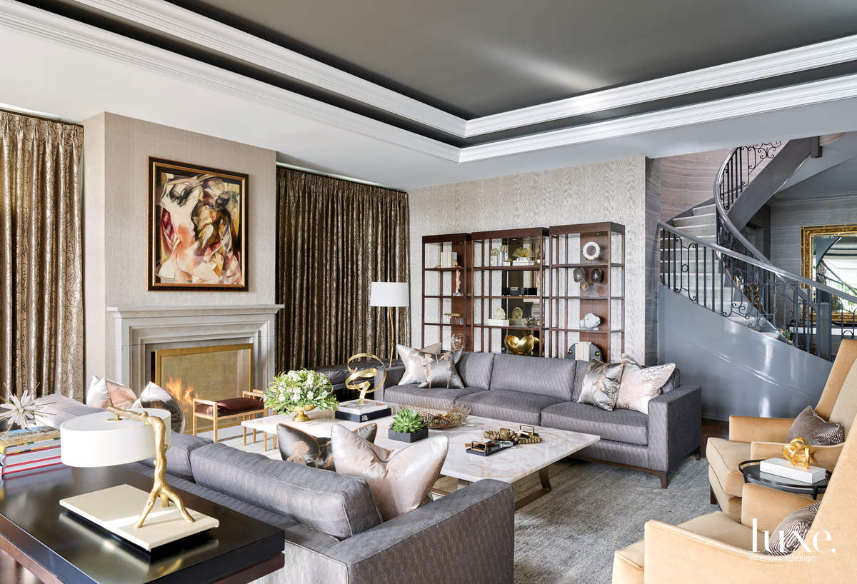 transitional living room gray with gold accents in home by designer Michael Abrams