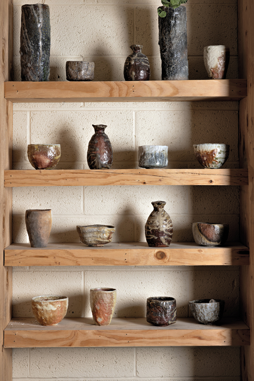 Vessels on a shelf.